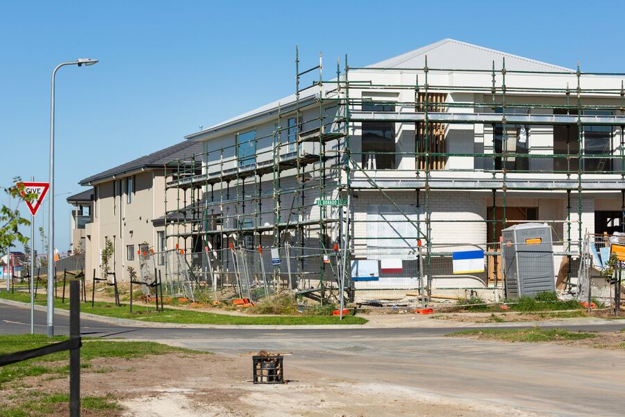 Commercial building under construction with scaffolding