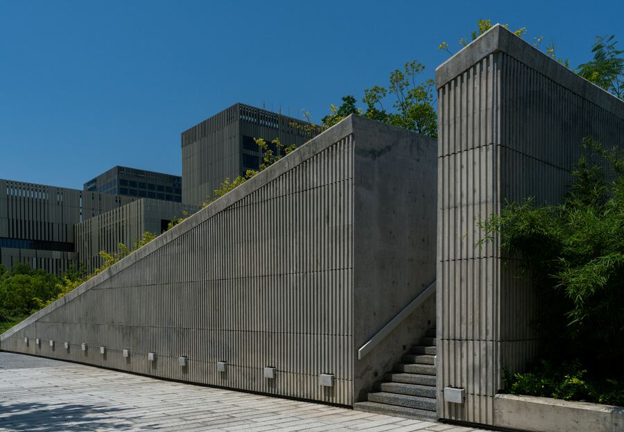 Modern concrete building facade with staircase detail
