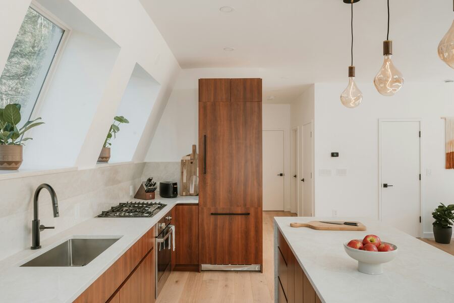 Modern remodeled kitchen with wood cabinets